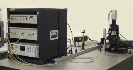 The receiver and probe laser are mounted in a 19” rack. The remote measurement head is fiber coupled.